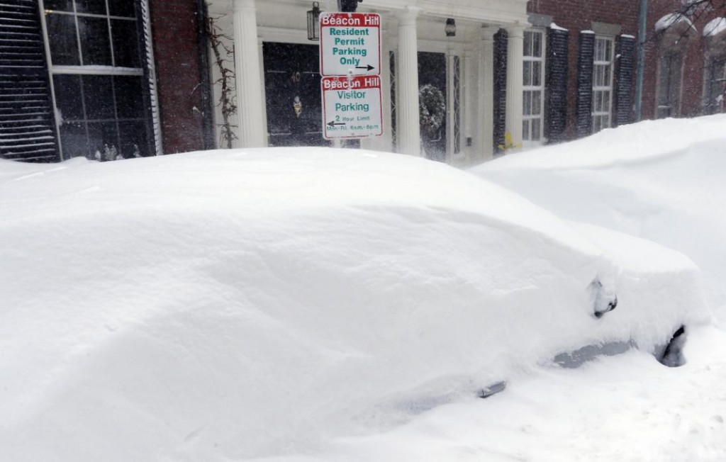 Northeast hit by blizzards, freezing cold, after record snow