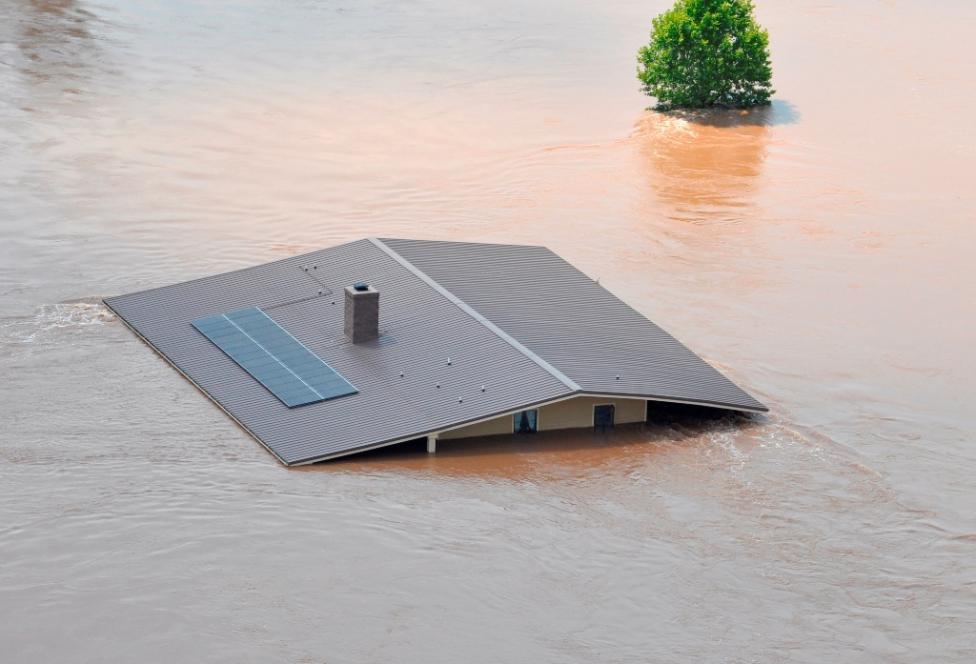 Flood waters from the Red River engulf a home in Shreveport