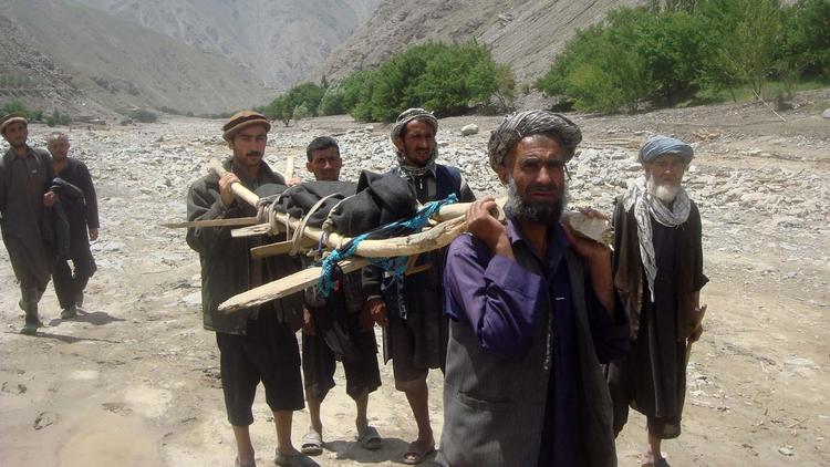 la-afghan-floods-20140608